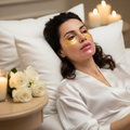 Woman relaxing with Aveliq Glow collagen eye and lip masks applied